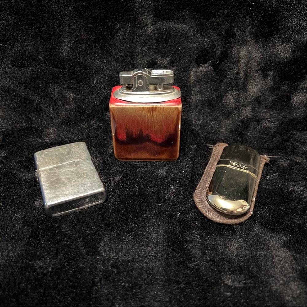 Elegant Silver, Gold, and Red Lighter Set